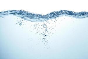 Blue water with waves and air bubbles on white background