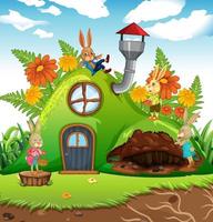 Garden scene with rabbit family cartoon character vector