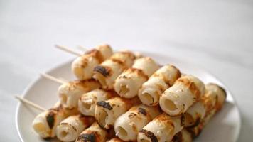 Grilled Tube Shaped Fish Paste Cake or Tube Squid Skewer video