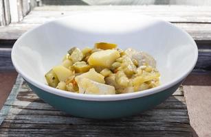 Bowl of tofu with vegetables photo