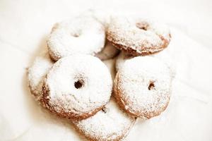 Donuts covered in powered sugar photo