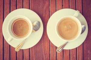 White coffee cups on the table photo