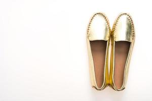 Golden woman shoes photo