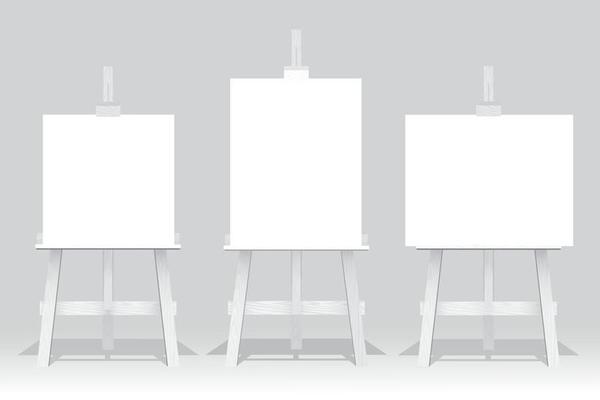 Wooden easel stand with blank canvas on white background