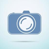 photocamera on blue background vector