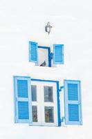 Blue window on Santorini, Greece photo