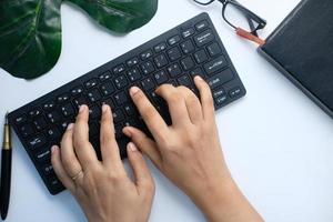 Top view of a person typing photo