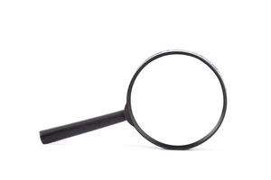 Magnifying glass isolated on white background photo