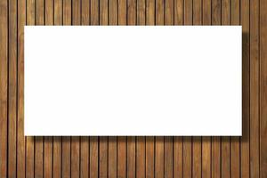Blank paper texture on vintage brown wood background photo