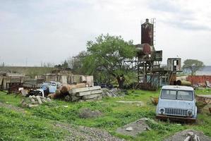 Ruined and abandoned plant with lots of waste matter. photo