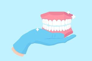 Vector cartoon hand of a dentist in a blue glove that hold a dental demo anatomical model of human jaw and teeth.