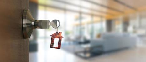 Open door at home with key in keyhole, new housing concept photo