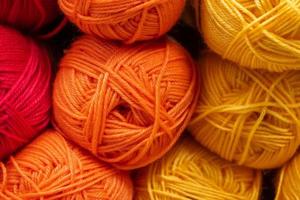 The texture of multi-colored fluffy woolen threads for knitting photo