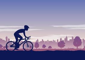 Silhouette of person riding a bicycle in a park vector