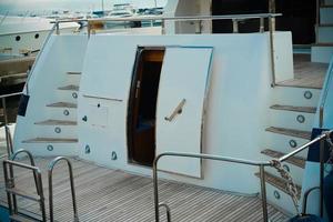 Detail of the interior of a sea yacht with a door and entrance. photo