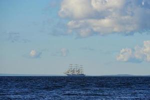 Vintage white sailboat on the background of the seascape. photo