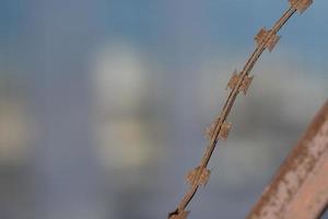 Blurred background with rusty metal wire. photo