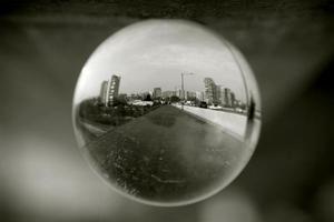 Landscape seen through the lens ball. photo