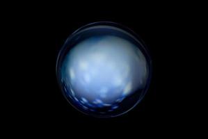 An abstract sphere with a blurry pattern isolated on black background. photo
