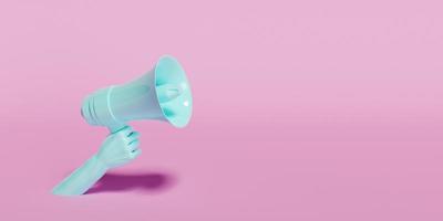 mano sosteniendo un megáfono azul sobre un fondo rosa con espacio para texto foto