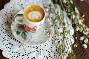 Cappuccino with flowers photo