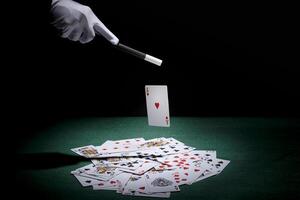 magician-performing-trick-playing-cards-