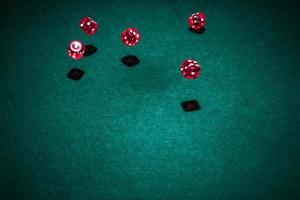 Red casino dice poker table