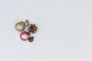 Shiny baubles with snowflakes