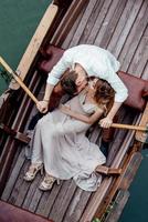 A boat trip for a guy and a girl along the canals and bays of the river photo