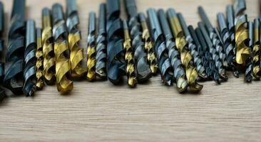 Drill bits on table photo