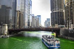 Chicago, Illinois, Mar 17, 2017 - Boat on the Chicago Riverwalk on St Patrick's Day photo