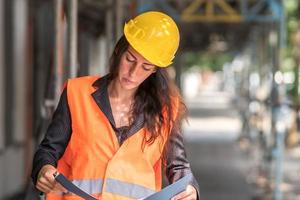 Female apprentice construction worker photo