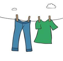 Cartoon vector illustration of hang laundry jeans and t-shirt.