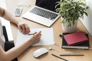 Young girl working at home office photo