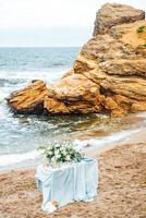 wedding ceremony area on the sandy beach photo