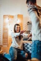 guy and a girl celebrate the new year together and give each other gifts photo