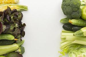 Green and yellow vegetables frame photo