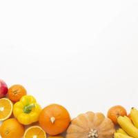 Yellow and orange vegetables with copy space photo