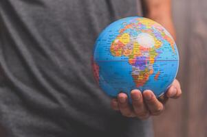 World Environment Day .Love the world .Hand holding a globe photo