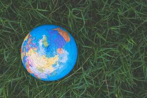 World Environment Day .Love the world .Hand holding a globe photo