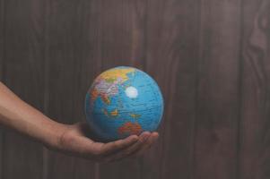 World Environment Day .Love the world .Hand holding a globe photo