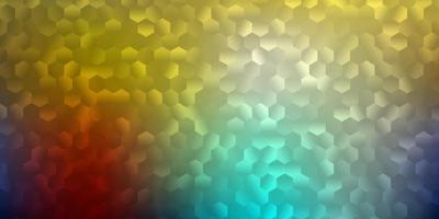 Light blue, yellow vector backdrop with a batch of hexagons.