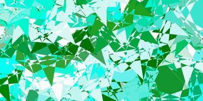 textura de vector verde claro con triángulos al azar.