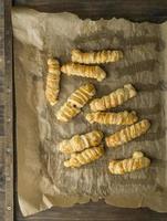 Top view of tequenos on a baking sheet photo