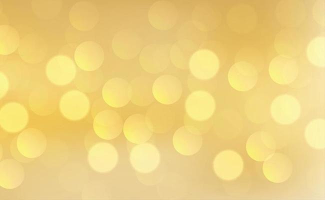 Yellow abstract blurred background with bokeh effect