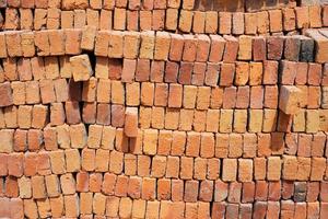 Abstract texture and background bulk of red bricks photo