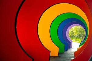 Perspective of colorful walkway in the shades of rainbow photo