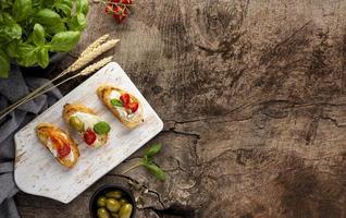 slices bruschetta copy space wooden background. High quality and resolution beautiful photo concept
