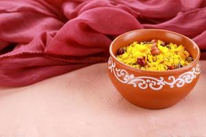 Bowl of maharashtra poha with red fabric