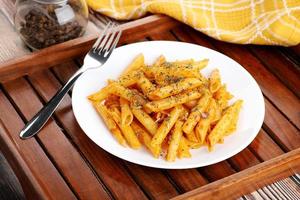 Pasta dish on a plate photo